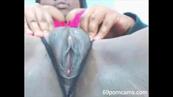 Ebony girl rubs her fat pussy and squirts mor