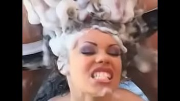 Fucking her hair in hot tub who is she