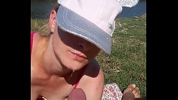 His wife sucks his dick while on the beach to t