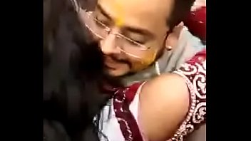 Cute indian bride kissing publicly