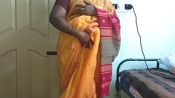 Desi indian horny tamil telugu kannada malayalam hindi cheating wife vanitha wearing orange colour saree showing big boobs and shaved pussy press hard boobs press nip rubbing pussy masturbation