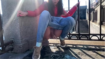 Girl pee in a public place